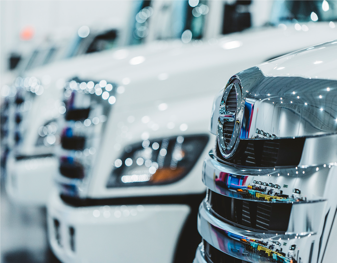 Hino trucks sitting in a row